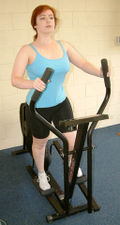 The Cross Trainer exercise machine can be used to warm up muscles in both the upper and lower body.