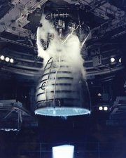 A remote camera captures a close-up view of a Space Shuttle Main Engine during a test firing at the  in 