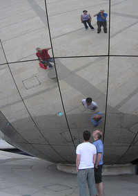 Reflections in a spherical convex mirror. The photographer is seen at top right
