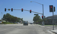 An typical example of how traffic lights are mounted in California.