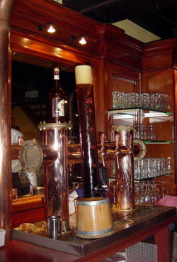 A column of beer and taps in a  in , .
