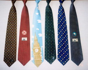 Modern neckties, shown here tied as if they were on a person, may be found in a vast range of colours and designs.
