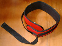 A lifting belt is sometimes worn to help support the lower back.