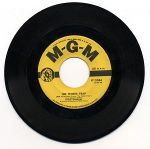 45 rpm records, like this one from 1955, often held a single - one especially popular tune from a particular artist - with a flip side, a bonus for owners.
