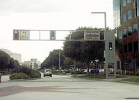 Wealthy cities like Cerritos often have elaborate traffic light gantries.