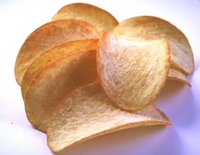 The regular shape of "Pringles" or similar potato chips reveals the non-traditional manufacturing method, involving reconstituted potato.
