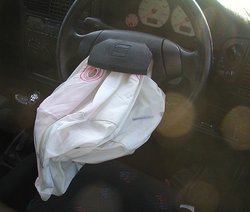 An automobile airbag, like this one in a crashed   , deflates after 0.3 seconds.