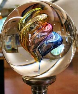 Glass can be made transparent and flat, or into other shapes and colors as shown in this ball from the  in .
