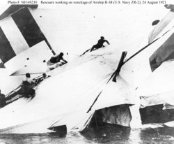 Rescuers scramble across the wreckage of British R-38/USN ZR-2, August 24th, 1921