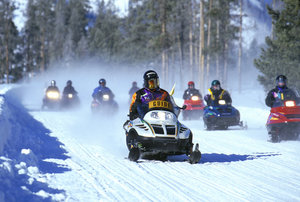 A snowmobile tour at Yellowstone National Park (NPS Photo)