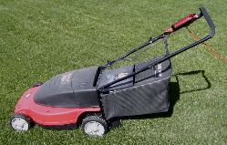 Electric rotary lawn mower with rear grass catcher.