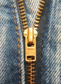 Closeup on the zipper of a jeans